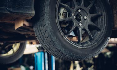 Close up the old tire at the repair garage.Repair car service concept